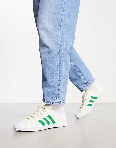 adidas adria weiß|adidas Originals Adria trainers in white and green.